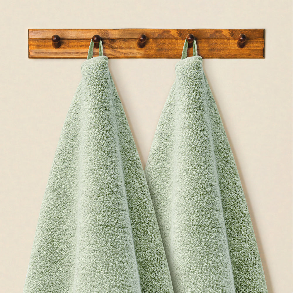 Eucalyptus organic cotton towels hanging by their built-in loops